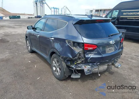 2014 Hyundai Santa Fe Sport 2.4L z USA, uszkodzony, nr VIN 5XYZU3LB1EG218928